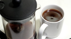 stock-footage-coffee-cup-of-hot-coffee-and-french-press